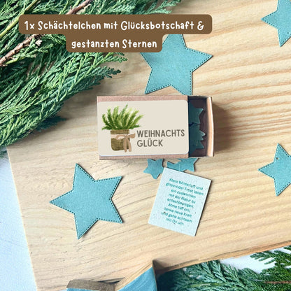 foodigence Kleine Glücksbotschaft mit dem Schriftzug „Weihnachtsglück“ im dekorativen Schächtelchen als Bestandteil des 3-teiligen Weihnachtsgeschenke-Sets