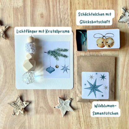 foodigence Designübersicht des weihnachtlichen Geschenksets mit drei aufeinander abgestimmten Produkten in Türkis und Gold, festlichen Weihnachtsornamenten, Sternmotiven und einer persönlichen Weihnachtsbotschaft