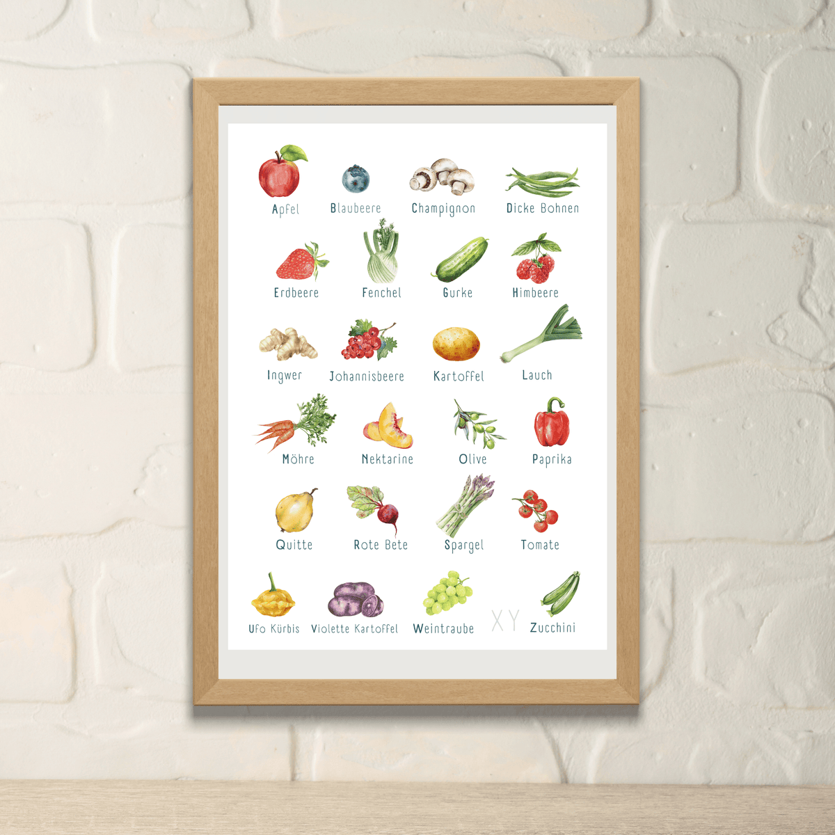 Poster von foodigence mit regionalen Produkten als ABC sortiert vor einer Steinwand