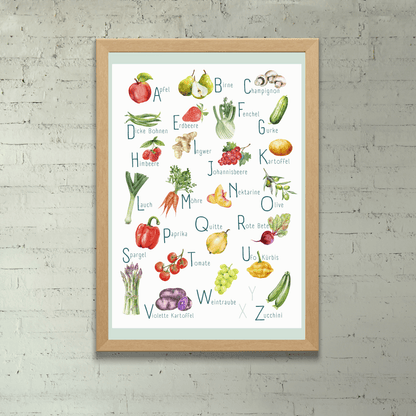 Poster von foodigence mit regionalen Produkten als ABC unsortiert (Collage) an einer Steinwand aufgehängt
