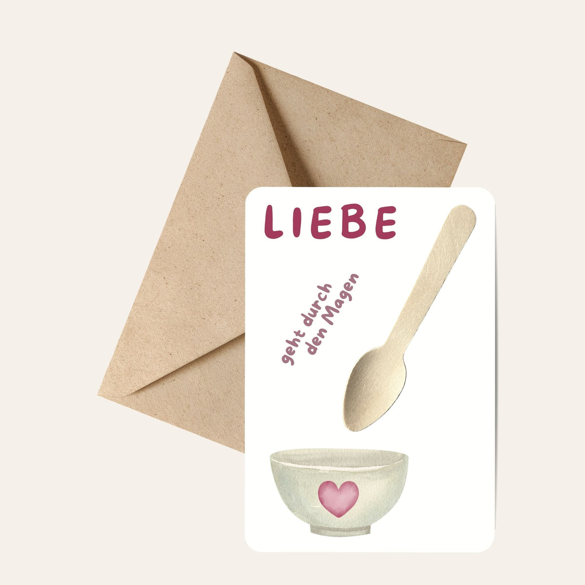 Postkarte von foodigence "Liebe geht durch den Magen" mit Holzlöffel und Umschlag